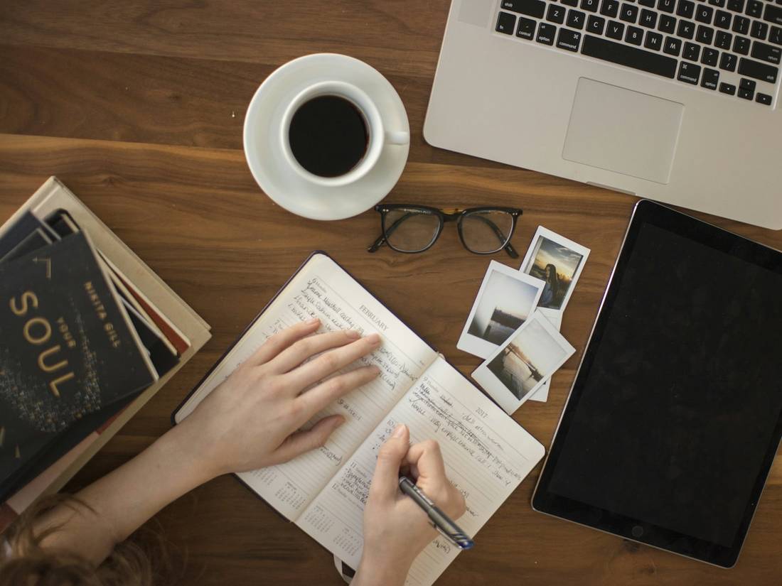 Planning at a desk with a notebook