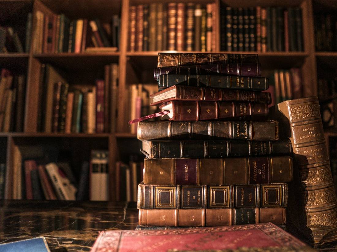 Books stacked on a shelf