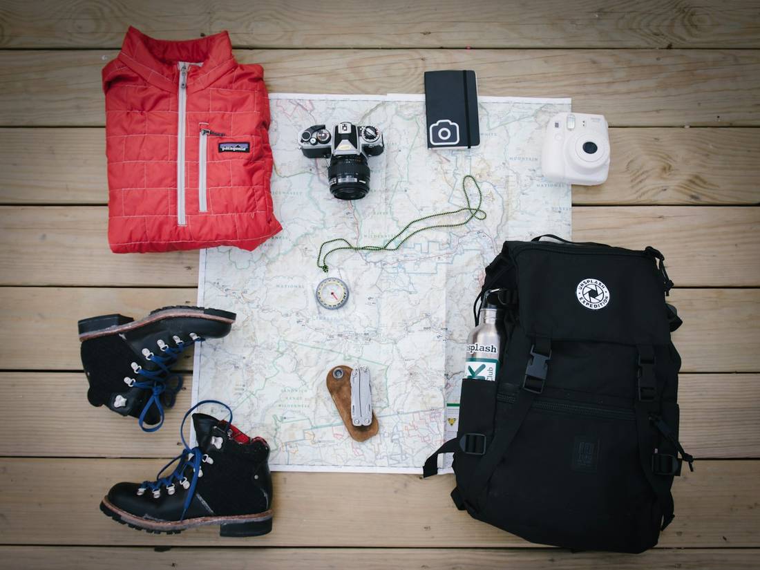 A backpack and camera ready for a trip