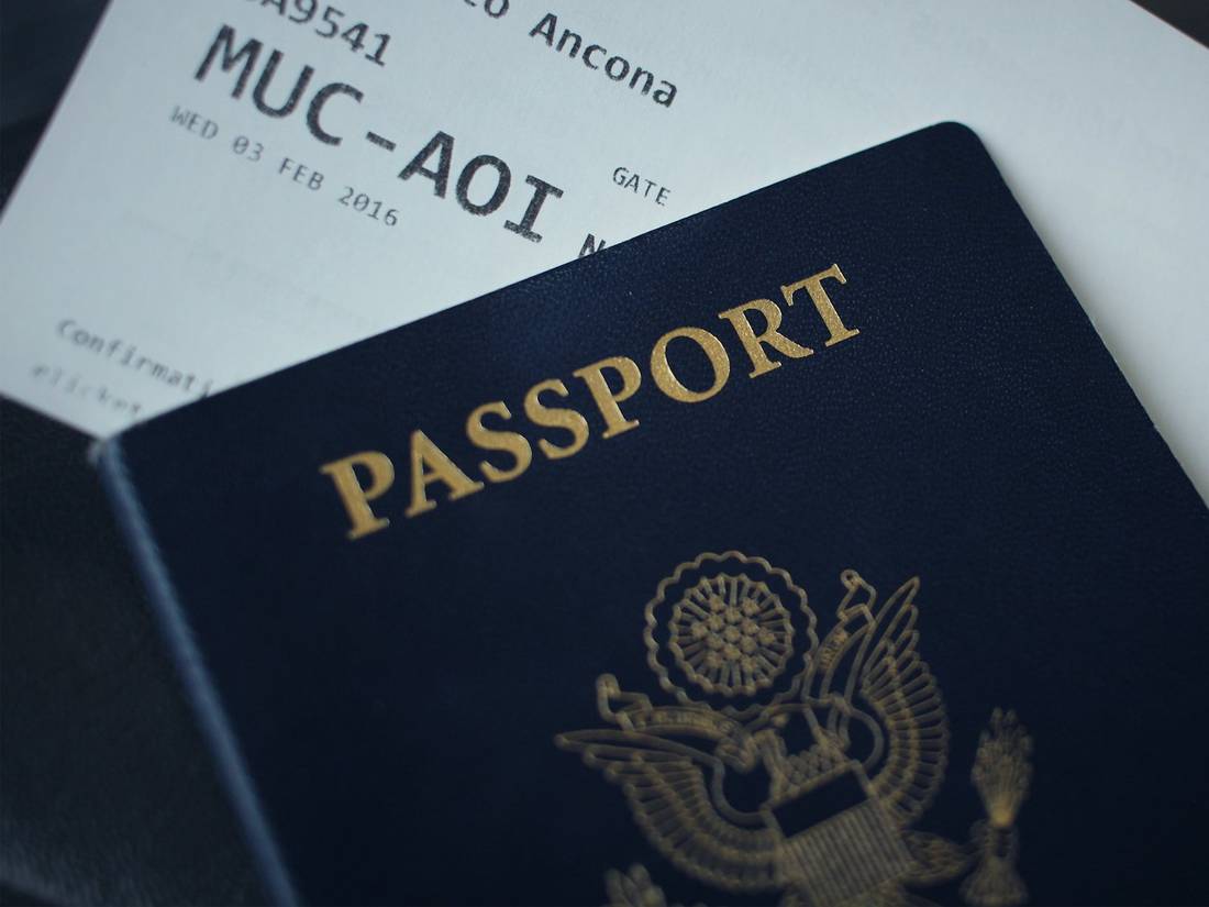 A passport on travel papers