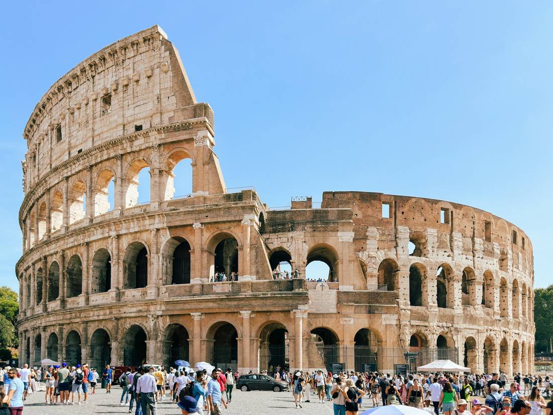 Visitors in front of a historic building
