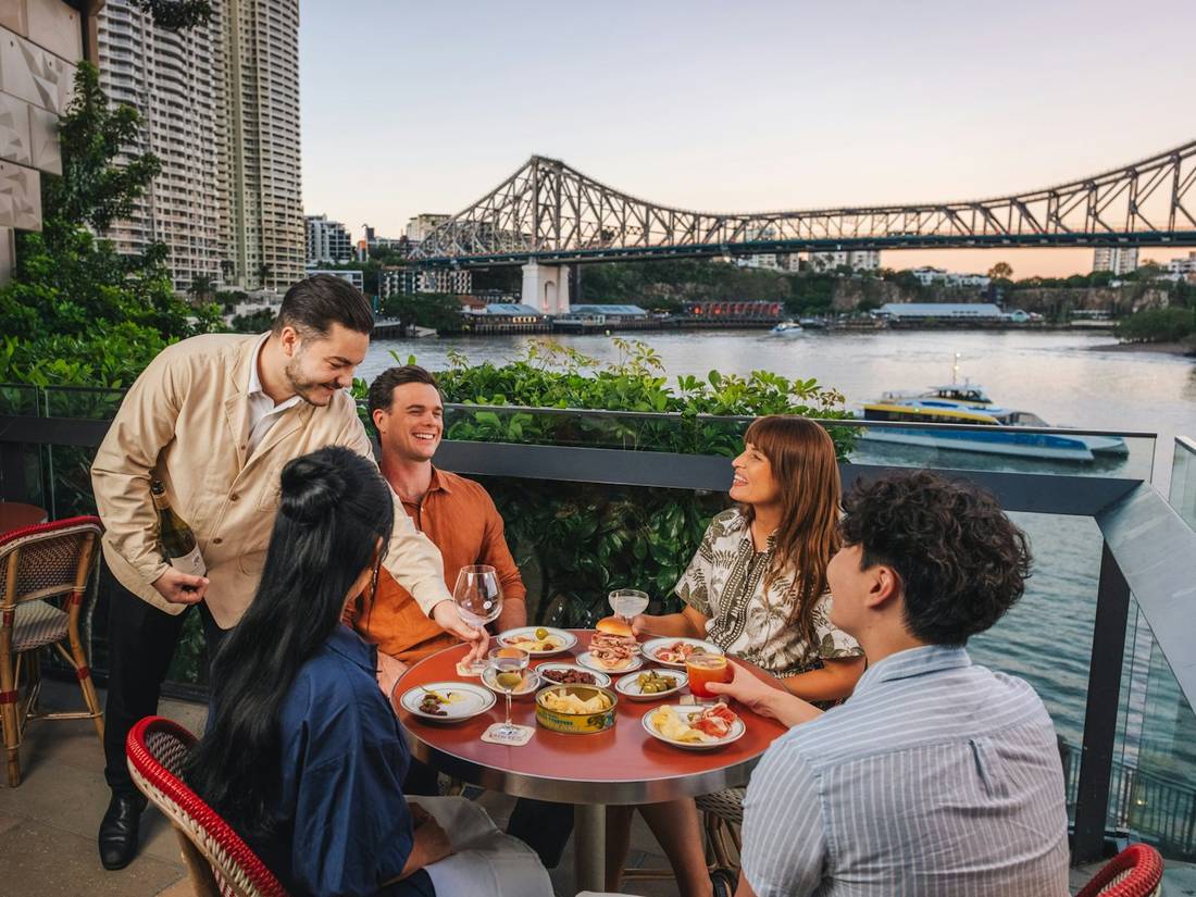 A group dining together on a terrace