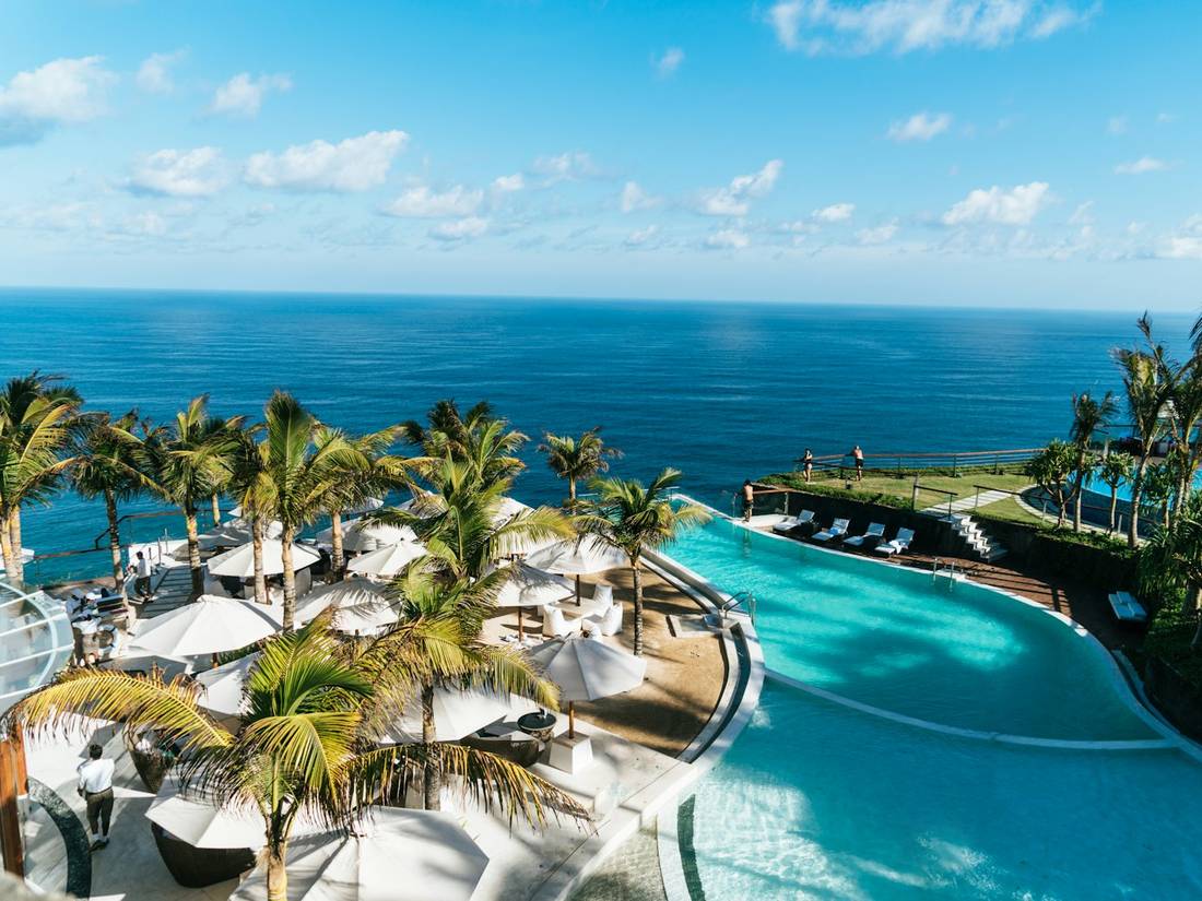 A resort pool overlooking the ocean